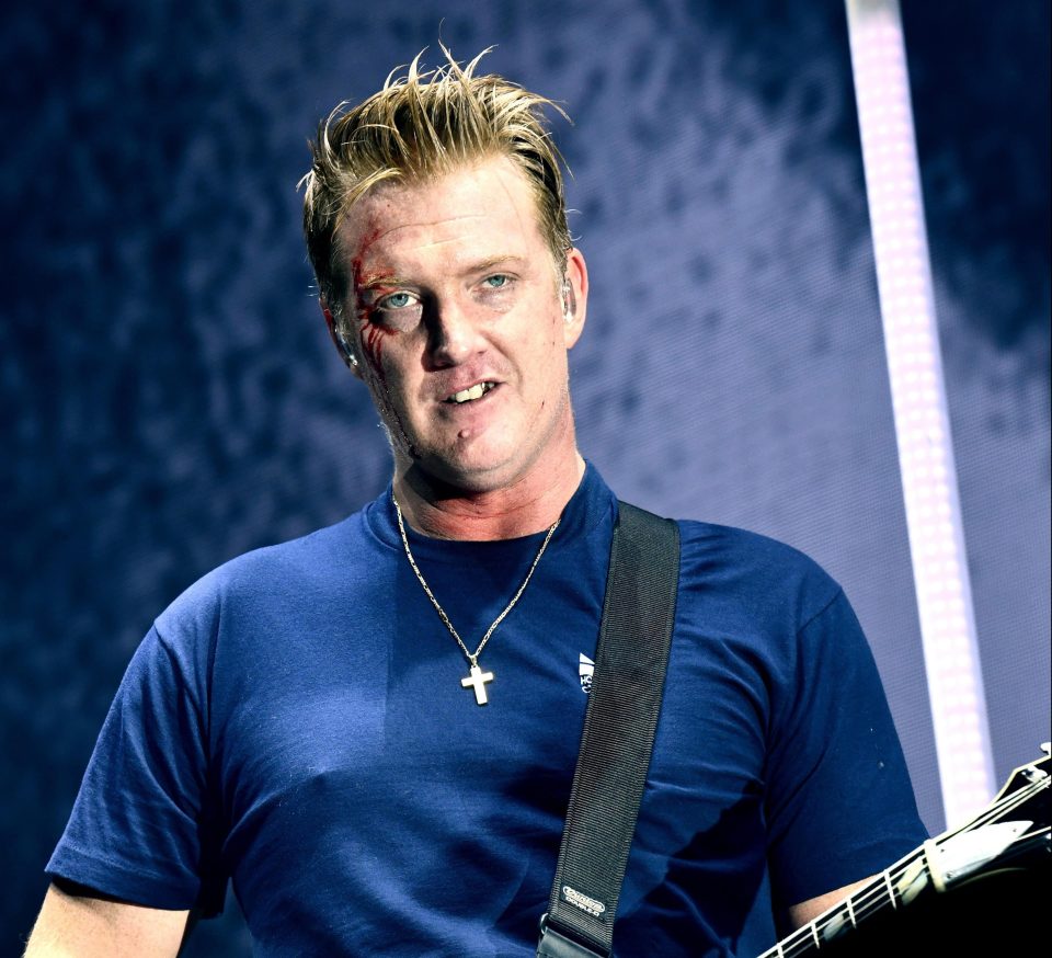 Josh Homme cutting face