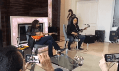 Ace Frehley and Gene Simmons play at fans home