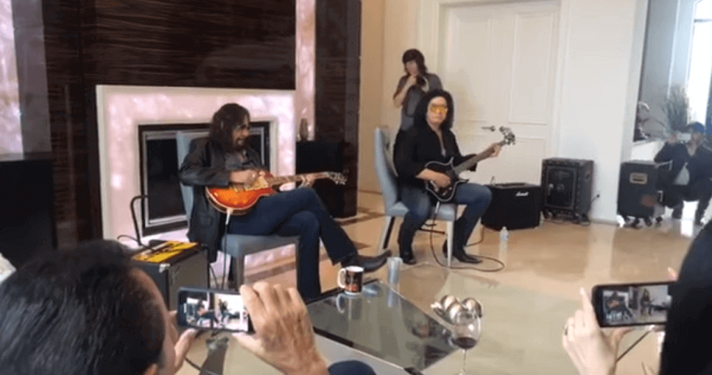 Ace Frehley and Gene Simmons play at fans home