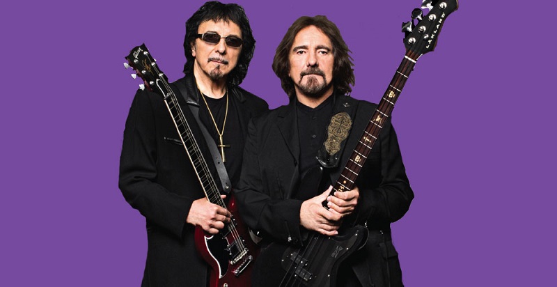 Geezer Butler and Tony Iommi purple background