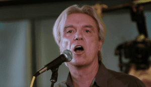 Watch David Byrne performing Bowie’s “Heroes” with choir