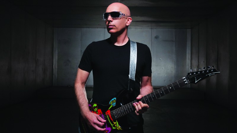 Joe Satriani playing the guitar