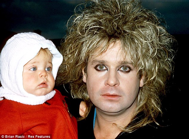 Ozzy Osbourne and baby in the 80s