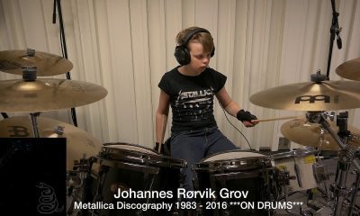 Kid playing Metallica on drums