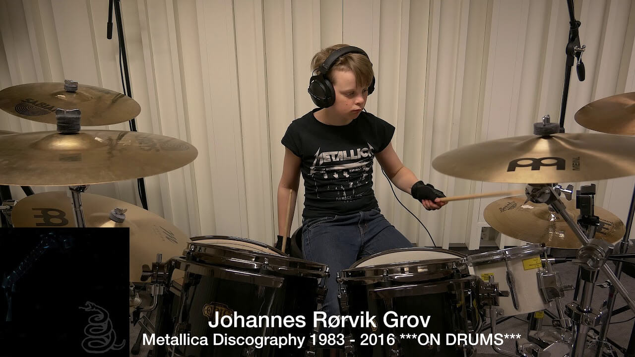 Kid playing Metallica on drums