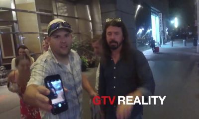 Dave Grohl signs autographs to fans