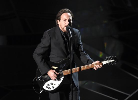 Eddie Vedder playing guitar
