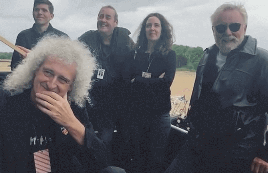 Brian May and Roger Taylor watch movies rehearsal