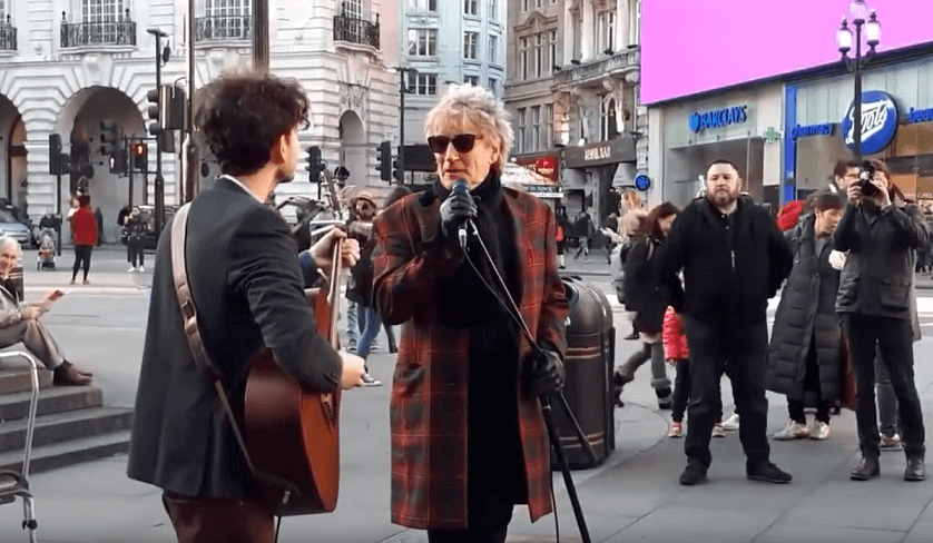 Rod Stewart with street musician
