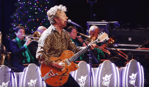 Watch Brian Setzer’s rockabilly version for ACDC’s “Let There Be Rock”