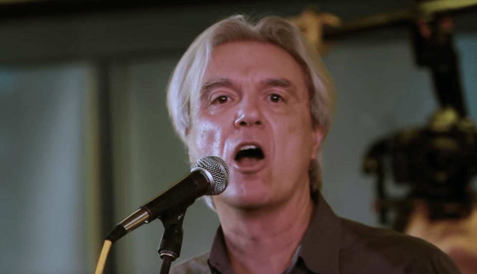 Watch David Byrne performing Bowie’s “Heroes” with choir