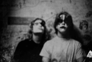 Metallica's James Hetfield and friend John Zander with Kiss make-up (Paul Stanley and Ace Frehley)