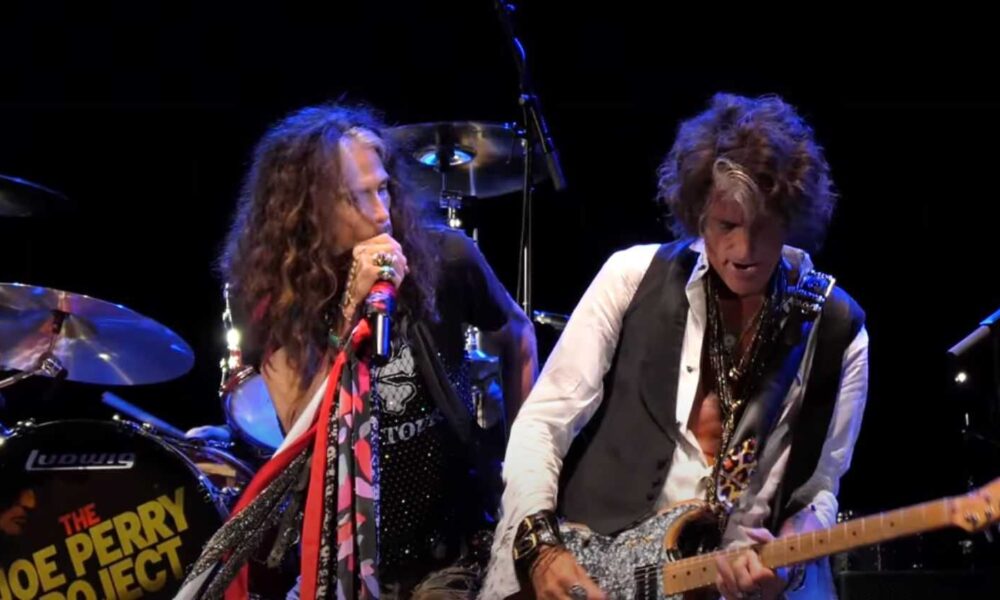 Steven Tyler joins Joe Perry and Brad Whitford on stage in Hollywood
