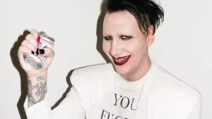 Manson reveals he broke his leg in two places and the reschedules dates