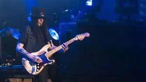 Mick Mars playing guitar