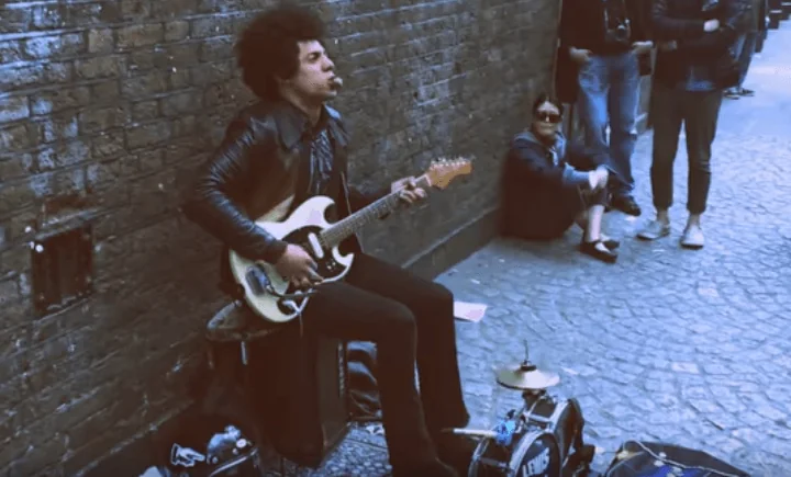 Street musician playing Motorhead Ace Of Spades