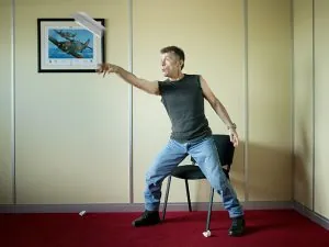 Bruce Dickinson throwing paper