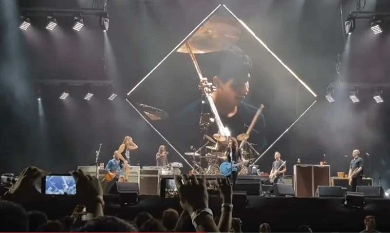 Fan plays drums with Foo Fighters