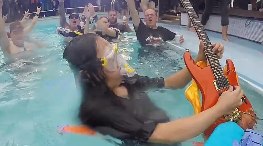 Playing guitar in the pool