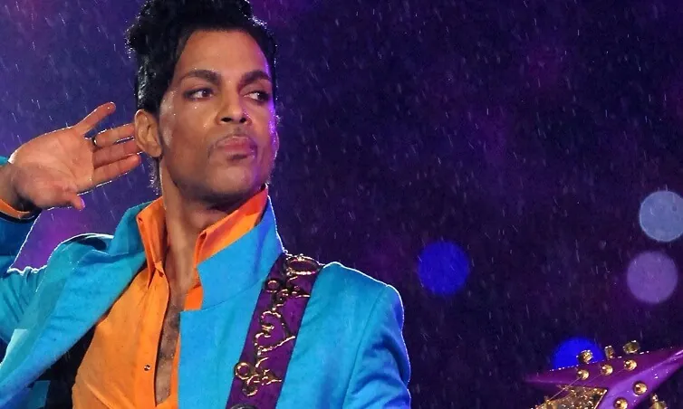Prince playing guitar